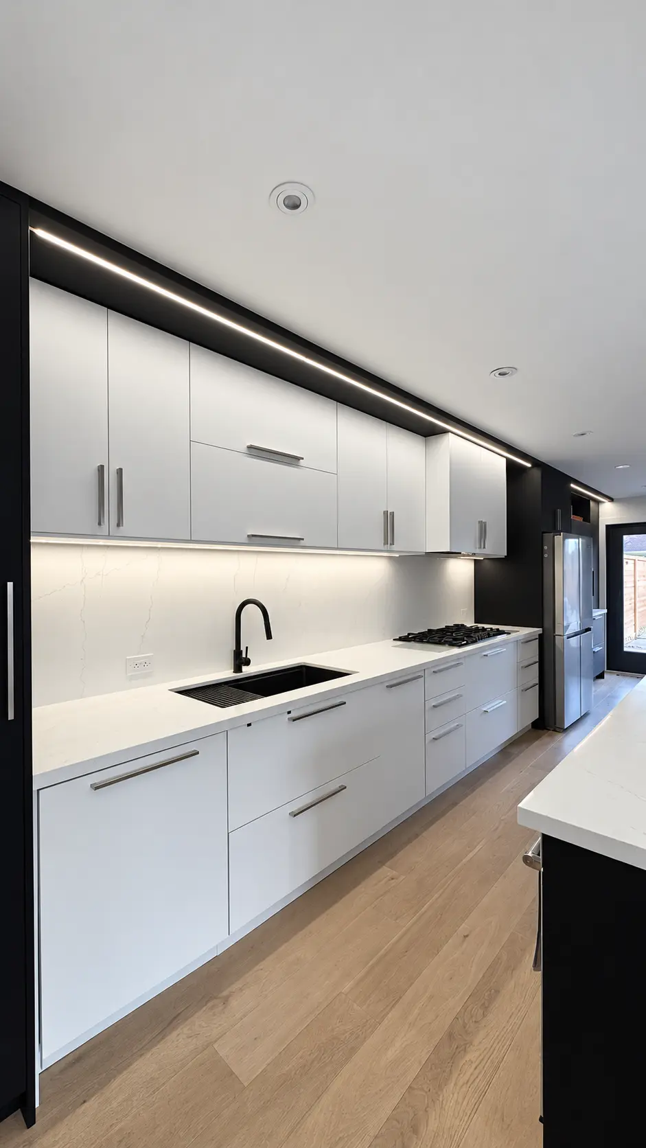Northaven black-and-white kitchen with integrated lighting